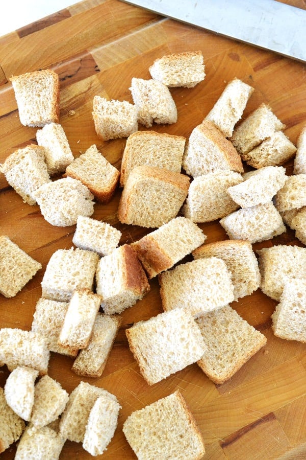 cubed bread on bread board