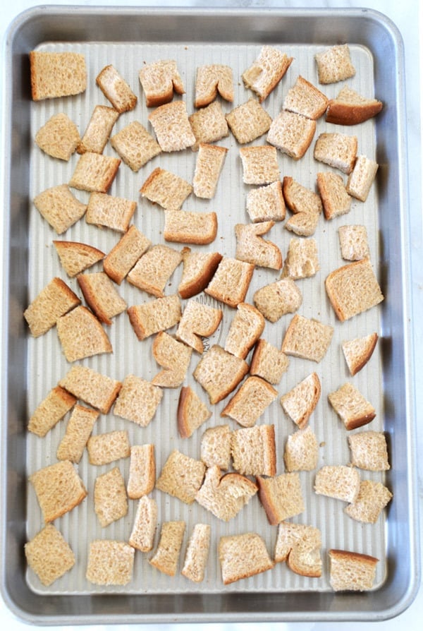 bread cubes on baking tray