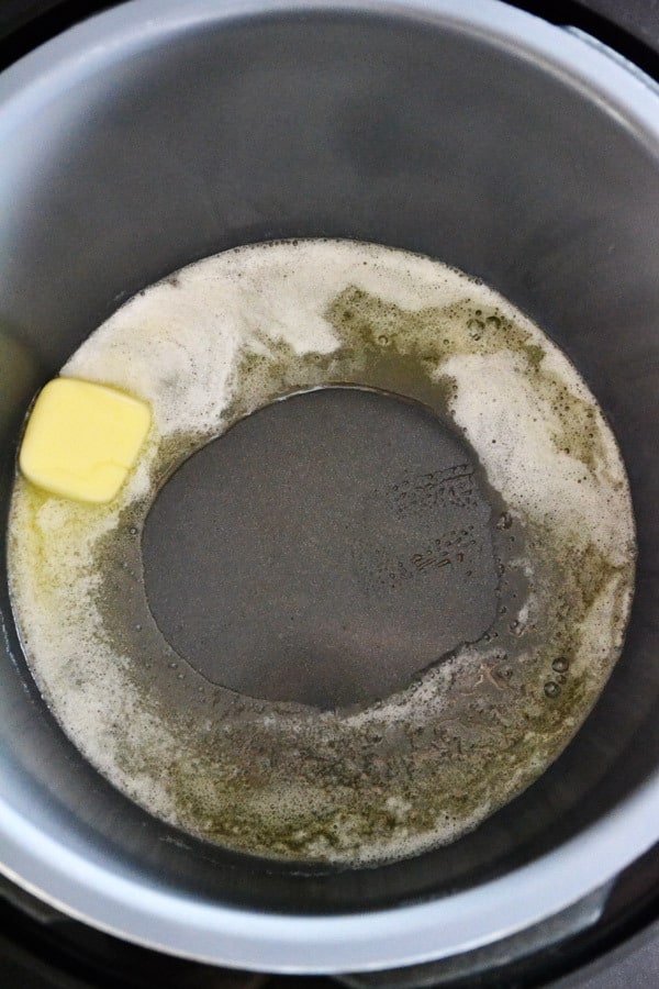 butter being melted in Fagor Lux Multi-Cooker on the saute setting