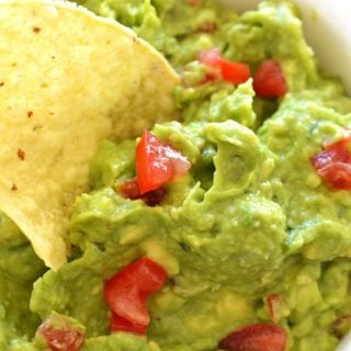 guacamole and chip in a bowl