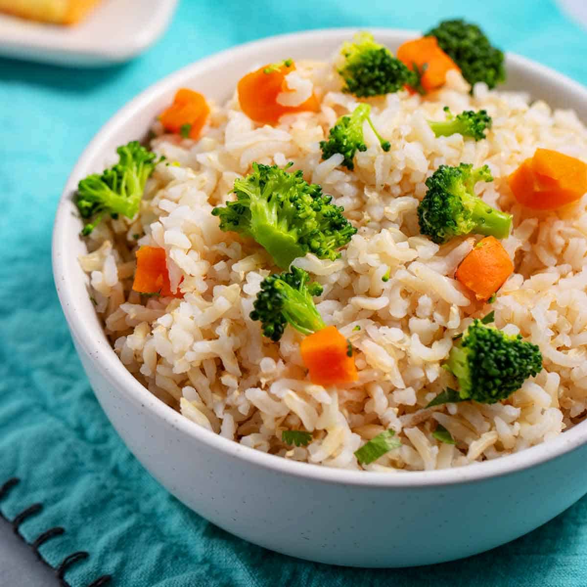 Bowl of brown rice and vegetables.