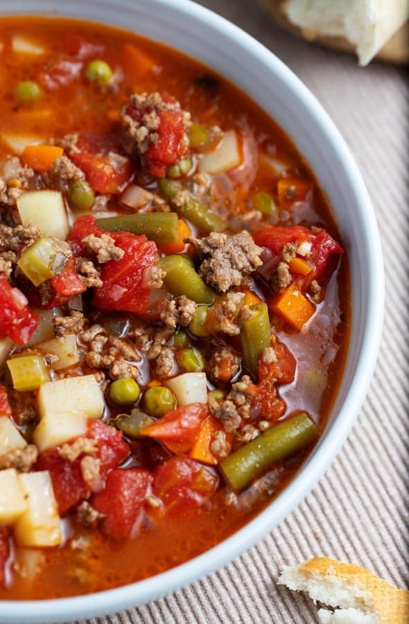 bowl of vegetable soup with ground beef
