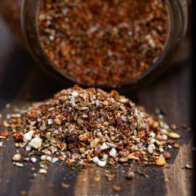 jar of spilled homemade montreal steak seasoning