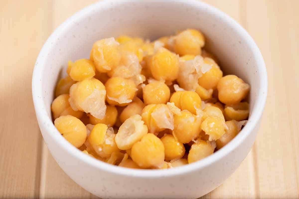 Bowl of cooked chickpeas that were soaked in baking soda water.