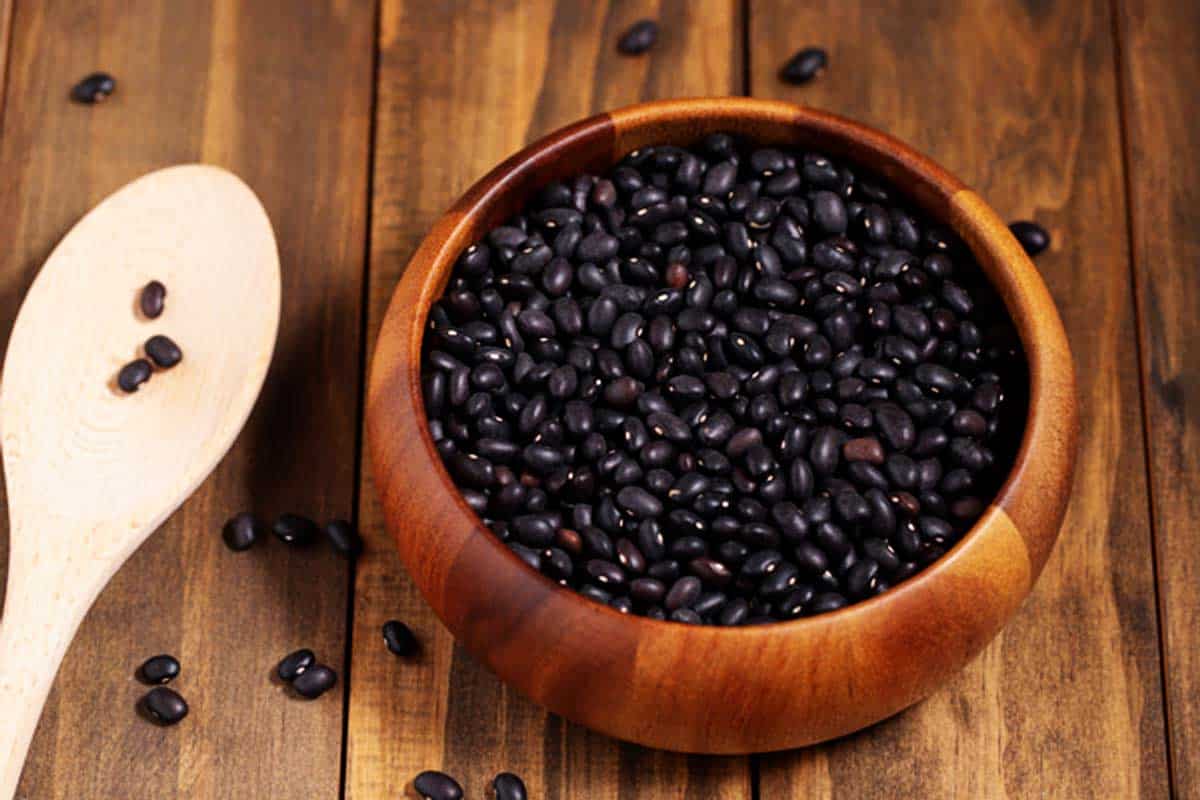 Bowl of dry black beans.