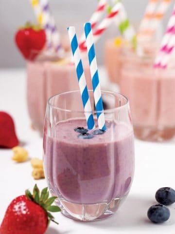 smoothie made with blueberries, strawberries, and bananas