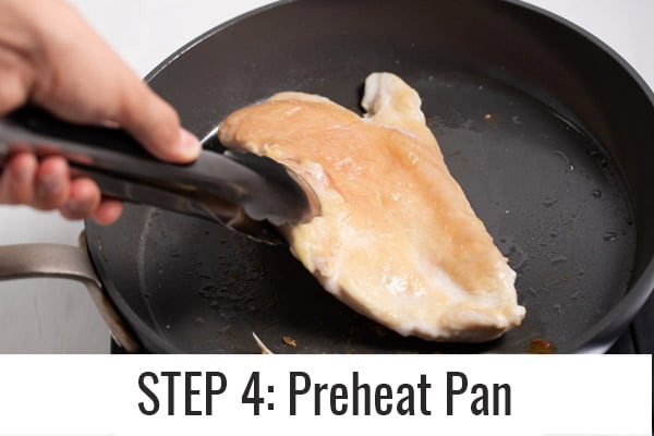 cooking chicken on preheated pan