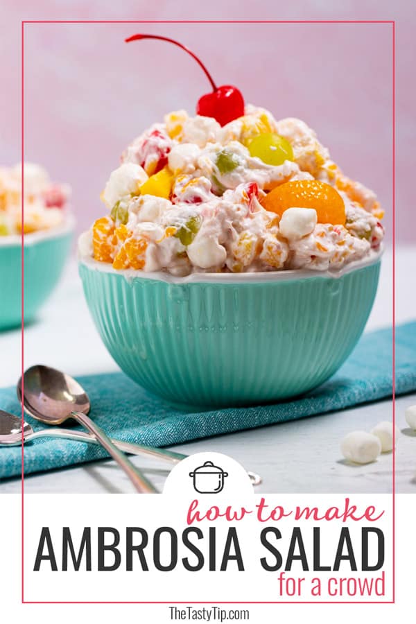 bowl of ambrosia salad with cherry on top