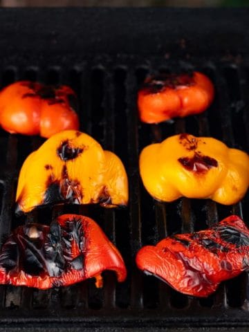 halved bell peppers on the grill