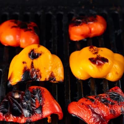 halved bell peppers on the grill