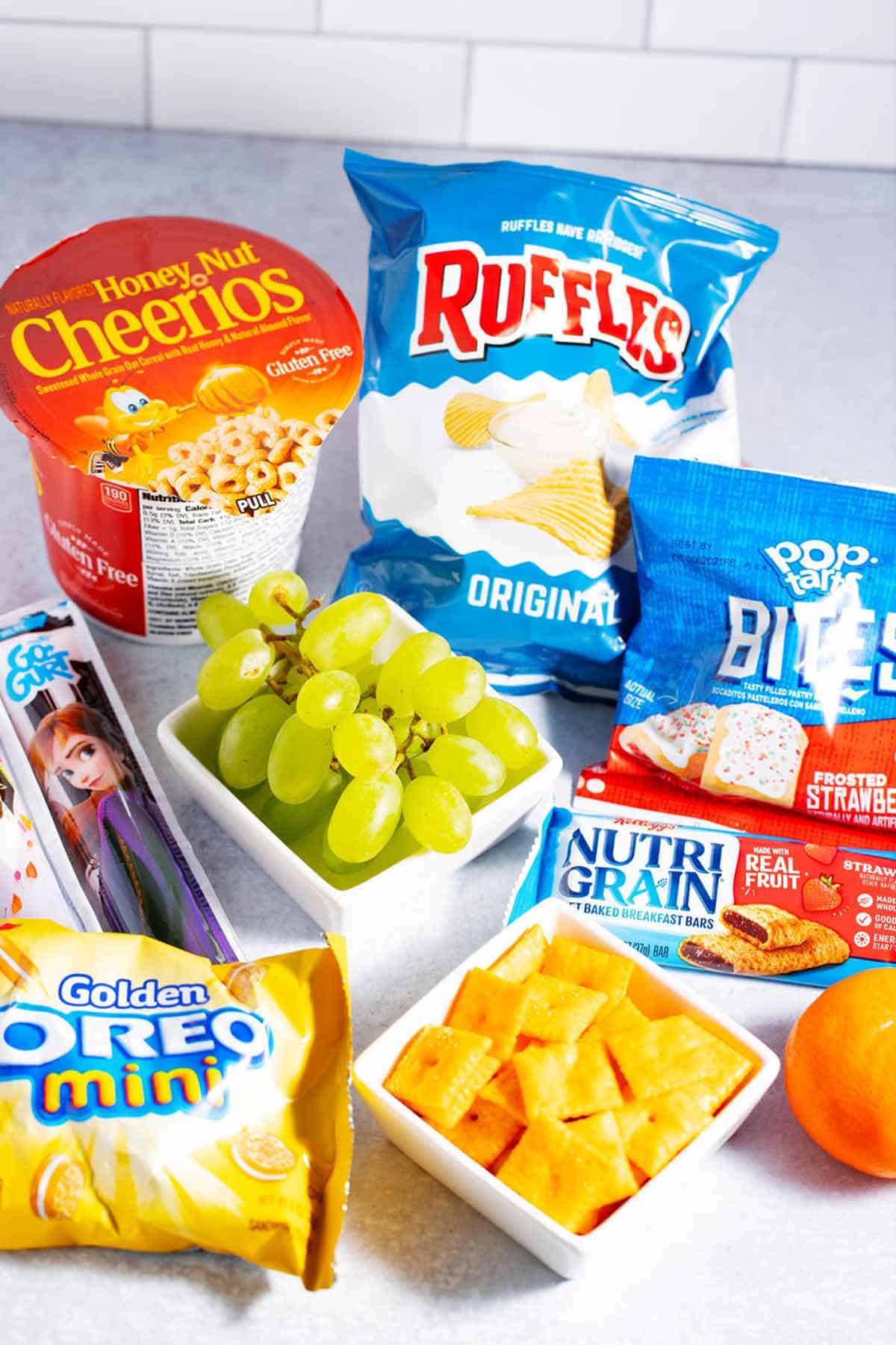 Snacks that kids with braces can eat like cheese crackers, grapes, soft bars, and yogurt.