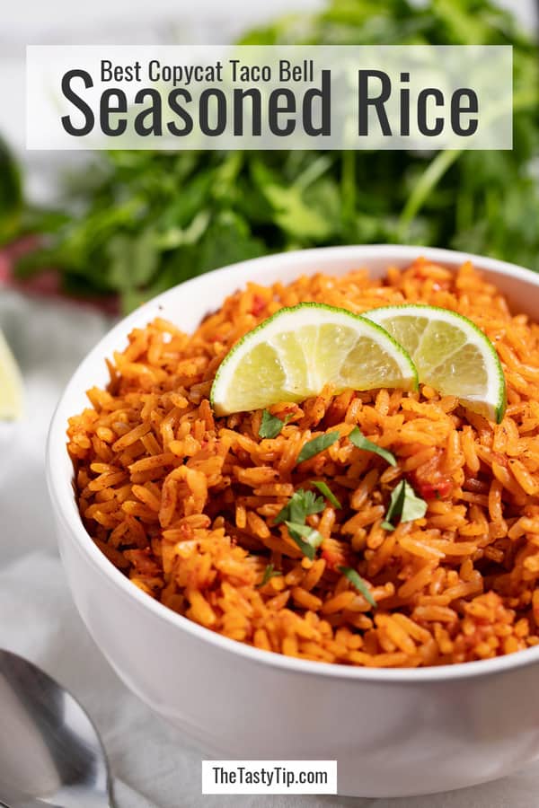 bowl of copycat Taco Bell seasoned rice with lime wedges