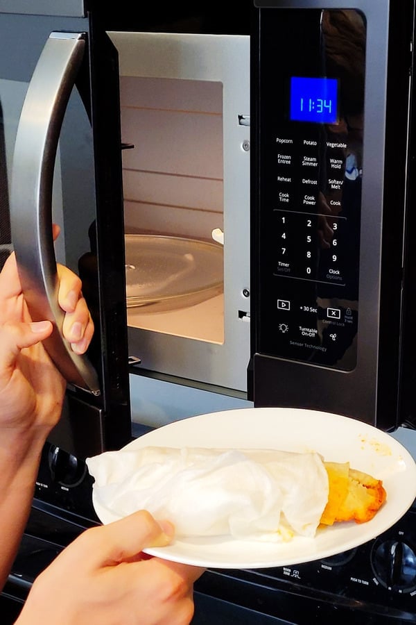 frozen tamale coming out of microwave