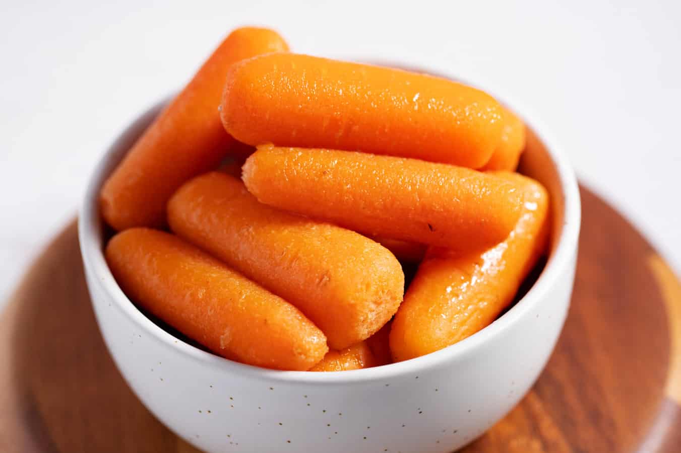bowl of cooked baby carrots