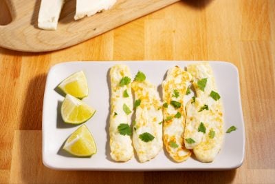 grilled panela cheese slices with lime quarters