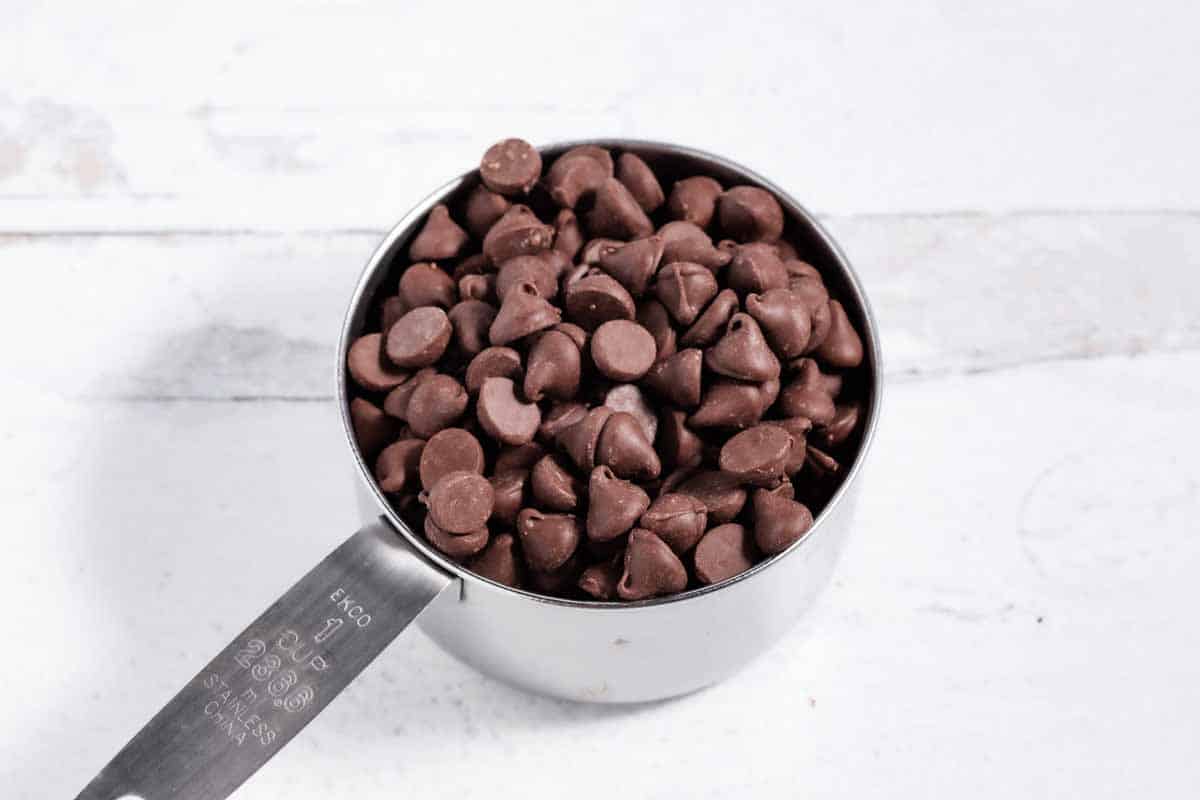 measuring cup of chocolate morsels