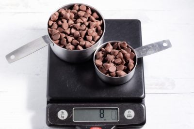 1 1/3 cups of chocolate chips on a kitchen scale