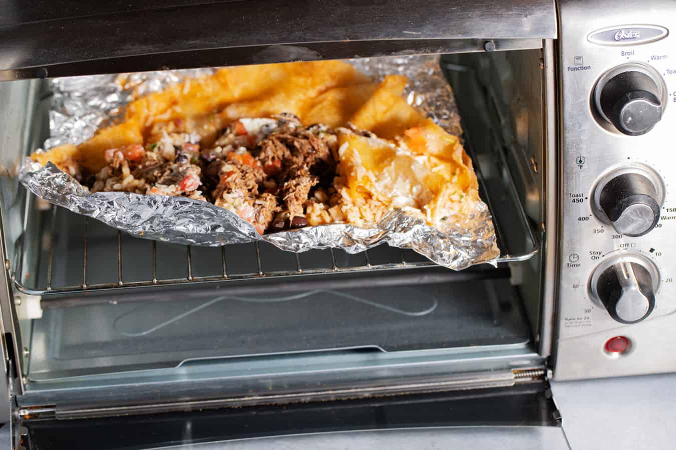 unrolled burrito in toaster oven to reheat