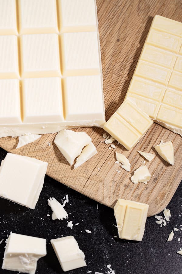 white chocolate and almond bark on a cutting board