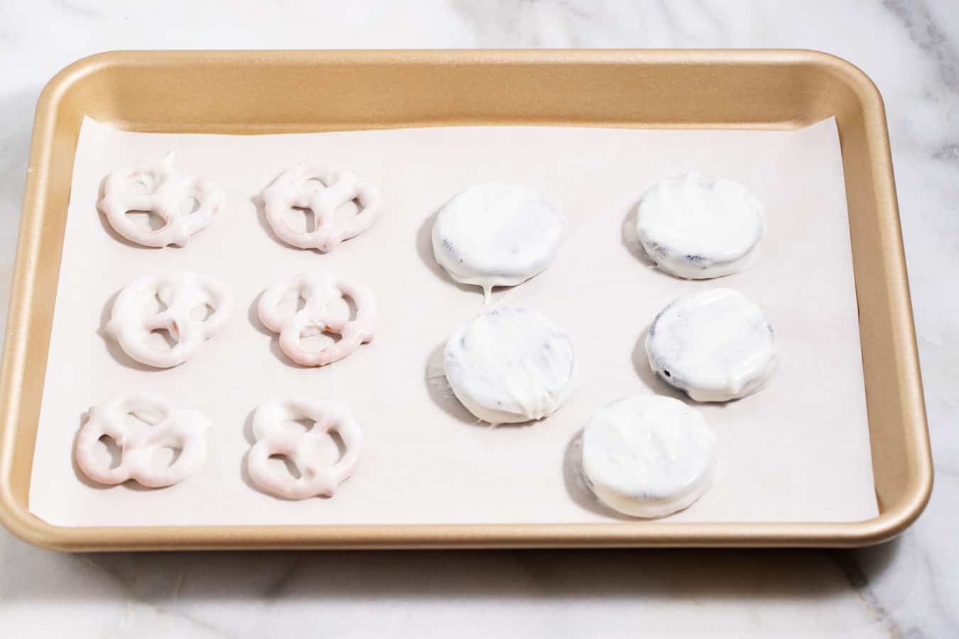 Pretzels and Oreos dipped in candy melts vs white chocolate.