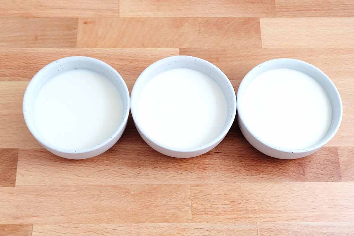 Bowls of milk, half and half, and cream.