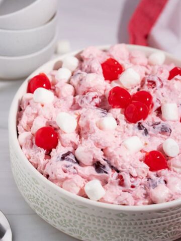 cherry fluff salad recipe without sweetened condensed milk with stacked bowls
