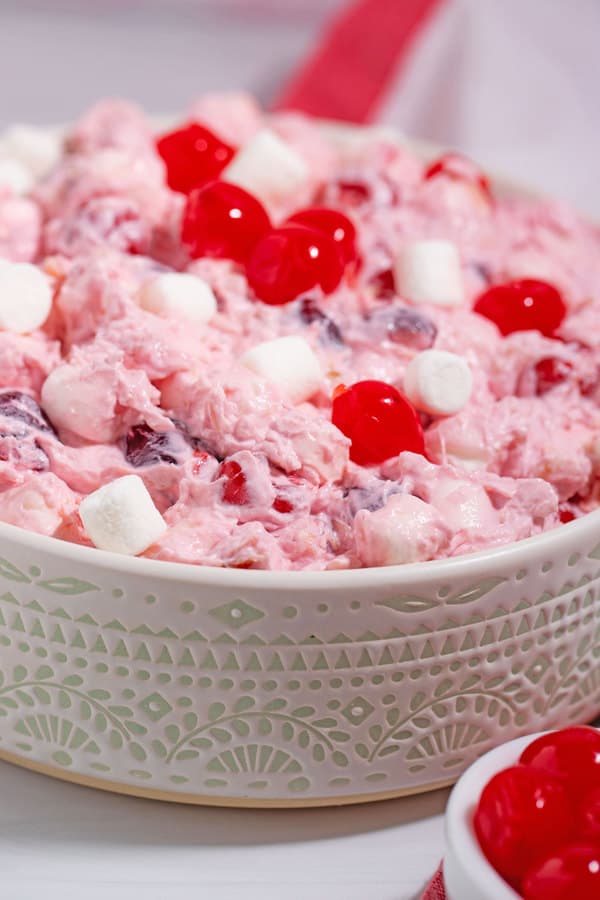 large serving bowl with cherry fluff salad recipe without sweetened condensed milk