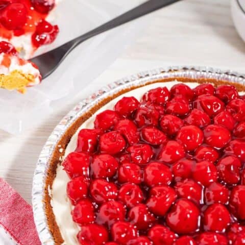 cherry pie recipe with canned filling and graham cracker crust with pie slice and fork