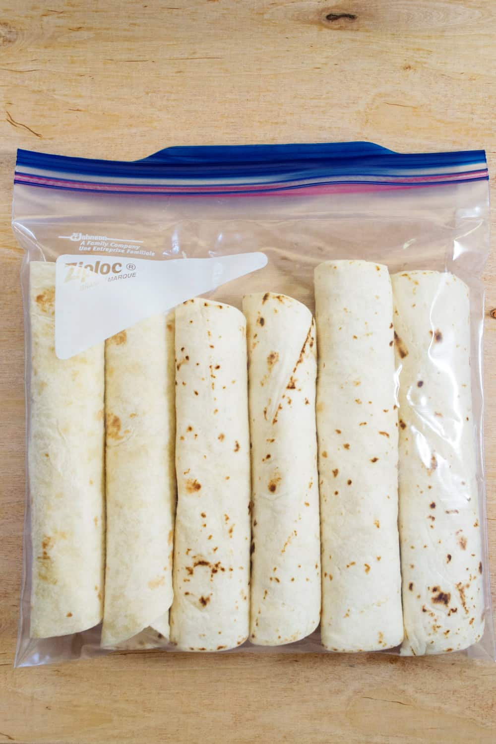 rolled enchiladas in a freezer bag