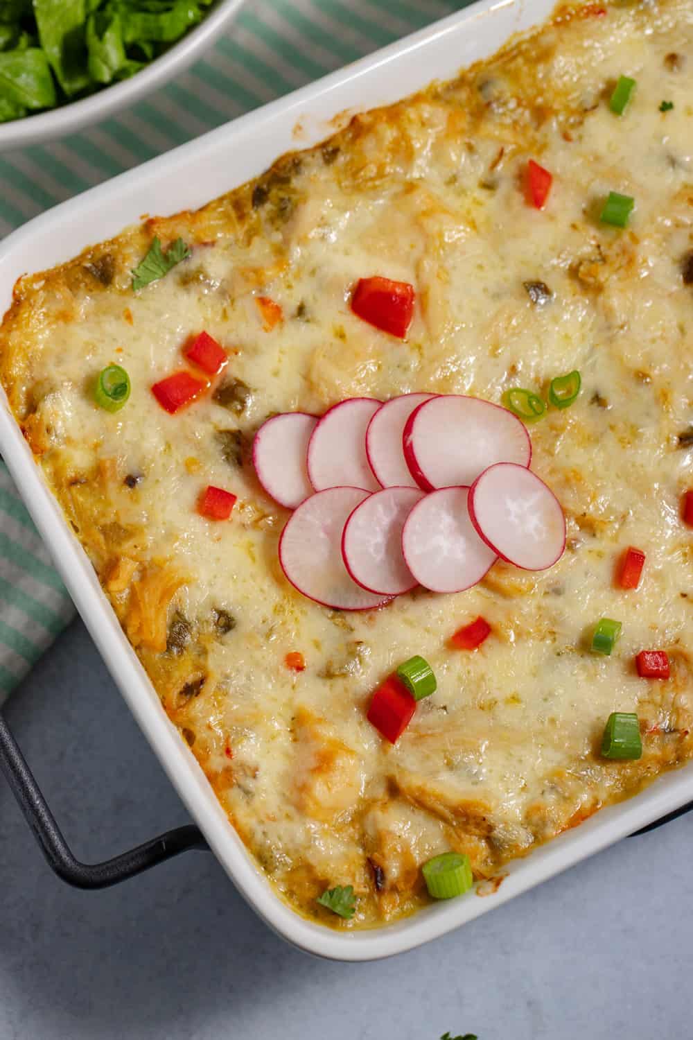 casserole pan of chicken enchiladas lasagna