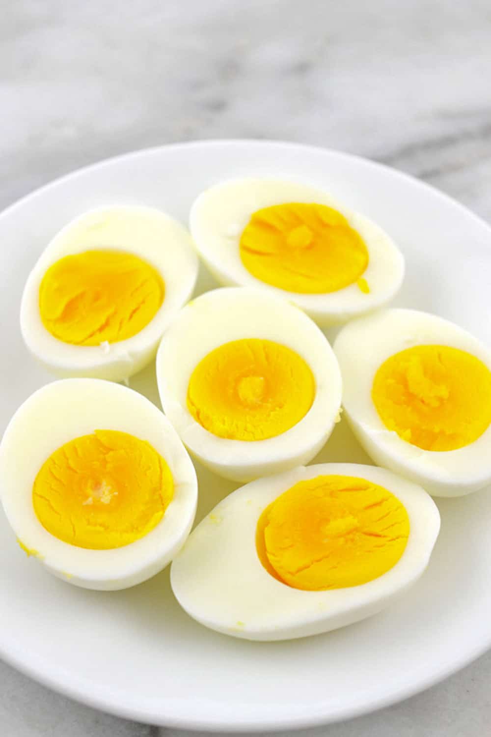 plate of hard boiled eggs cut in half