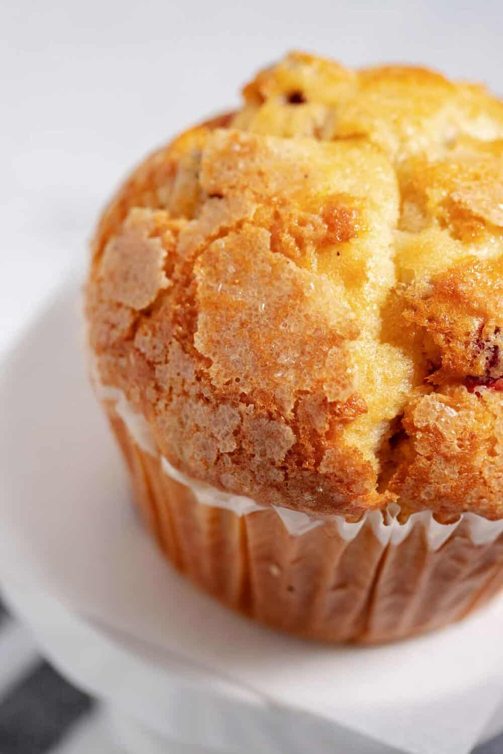 Closeup of crispy topped muffin.