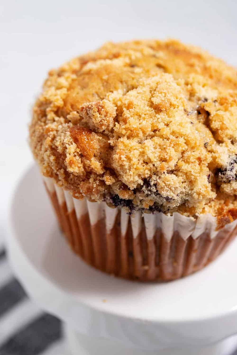 Bakery style muffin with streusel topping.