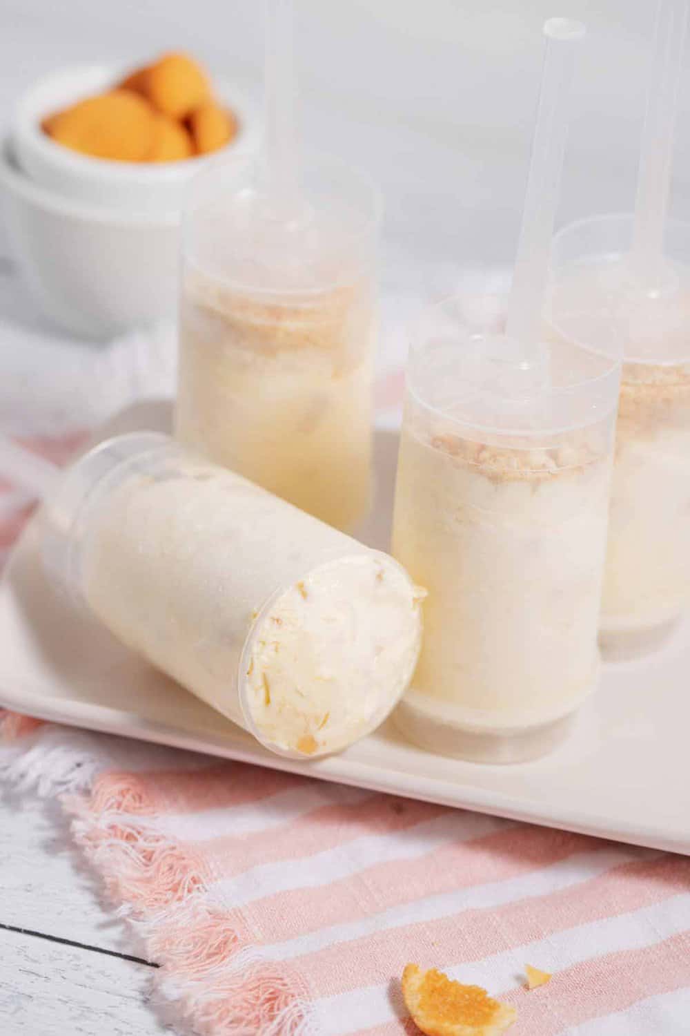 Banana pudding ice cream popsicle on plate.