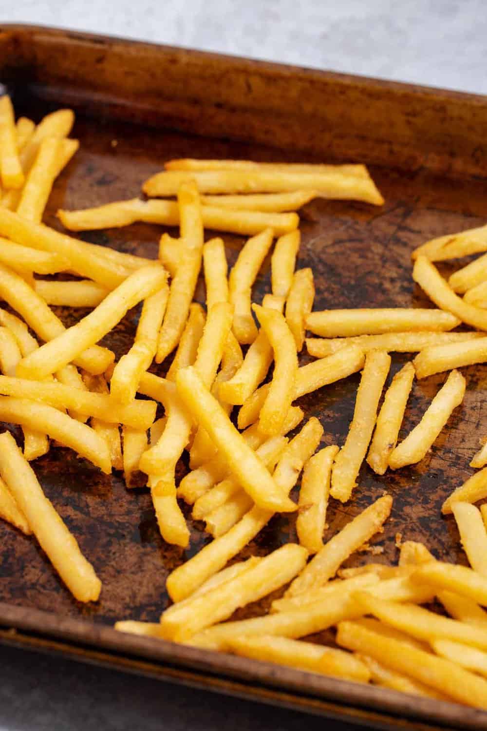 French fries on a baking sheet