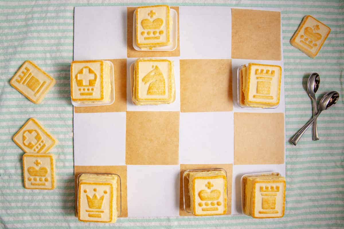 Chessmen banana pudding squares on a Chess board