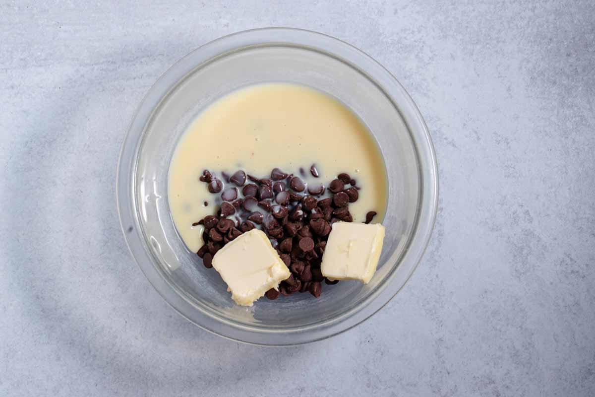 butter, sweetened condensed milk, and butter in bowl