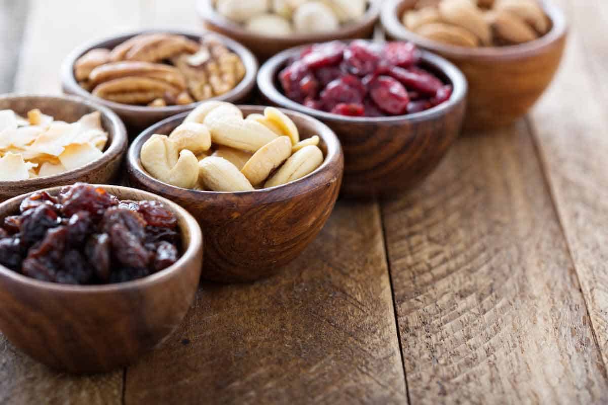 bowls of nuts and dried fruit