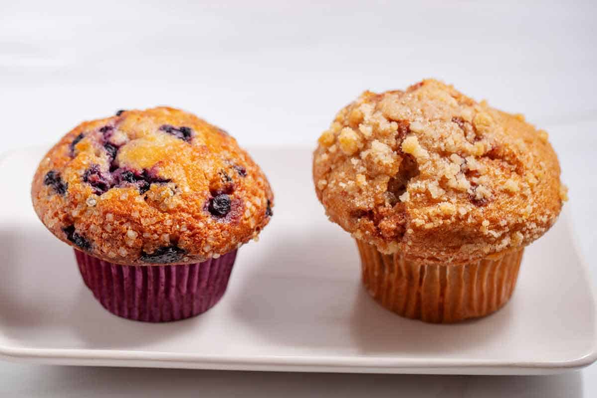 side by side comparison of different bakery style muffins