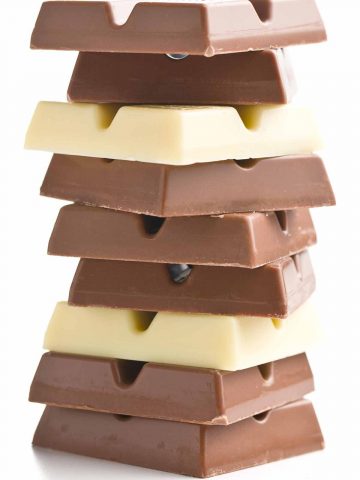 stack of white and milk chocolate squares