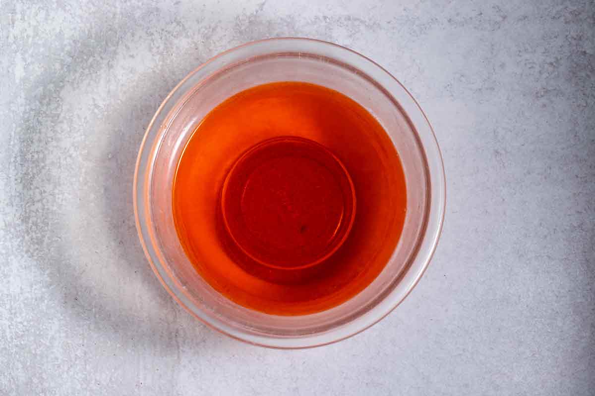 bowl of dissolved orange jello
