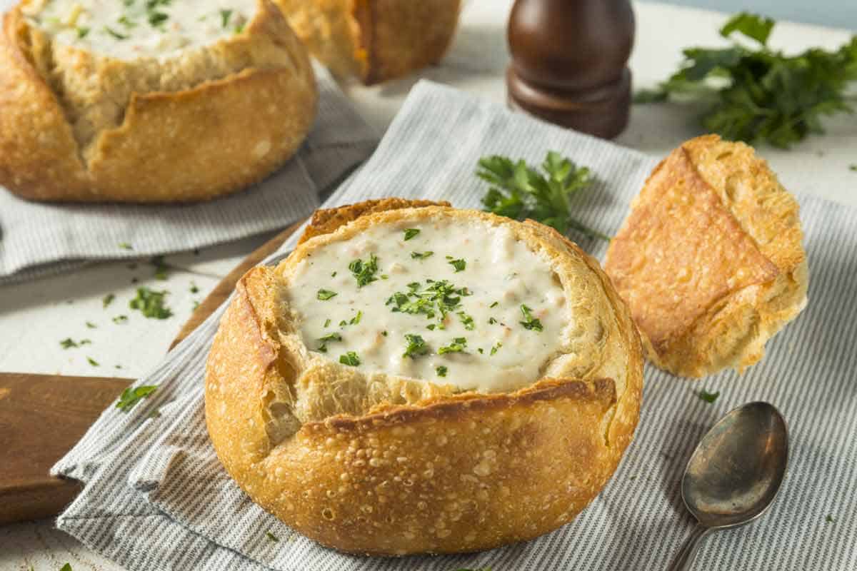 Bread bowl filled with potato soup.