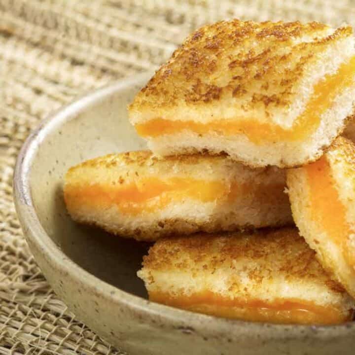 Bowl of grilled cheese sandwiches.