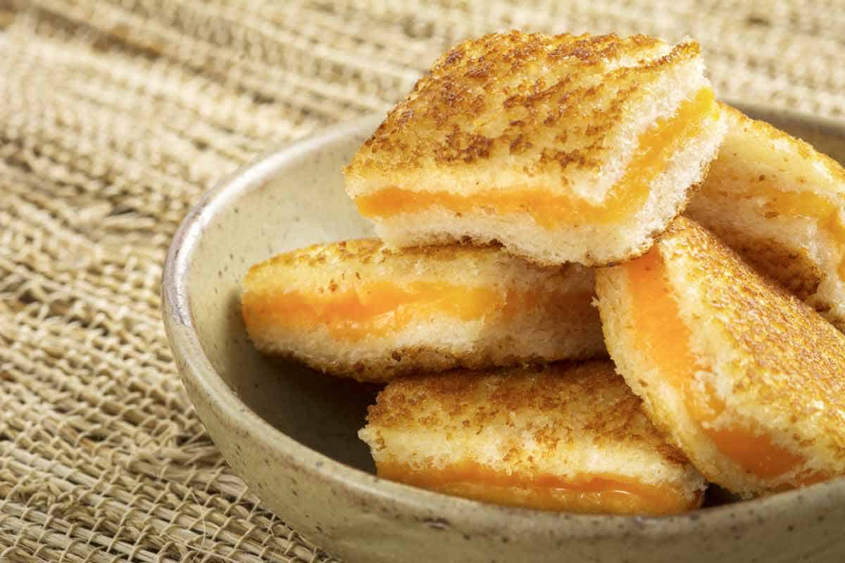 Bowl of grilled cheese sandwiches.