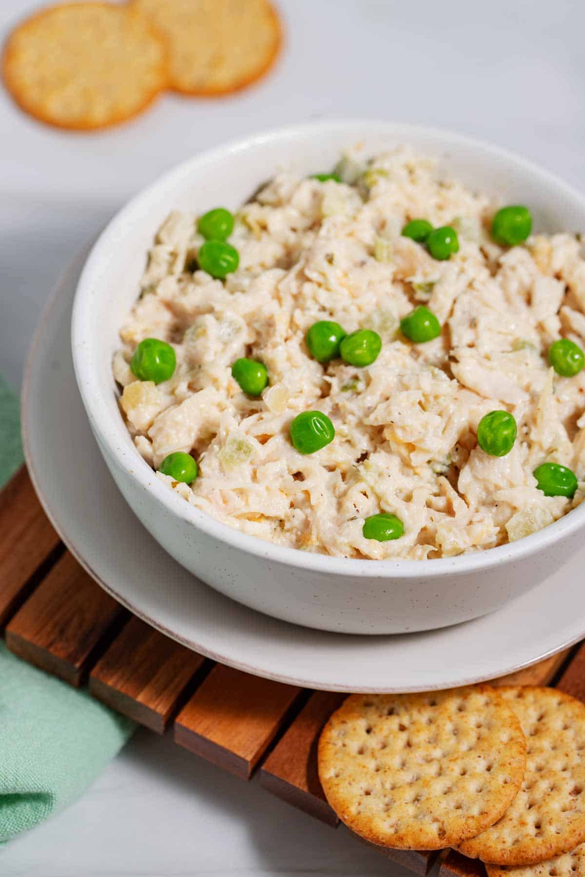 Store-bought chicken salad with peas added to improve the taste.