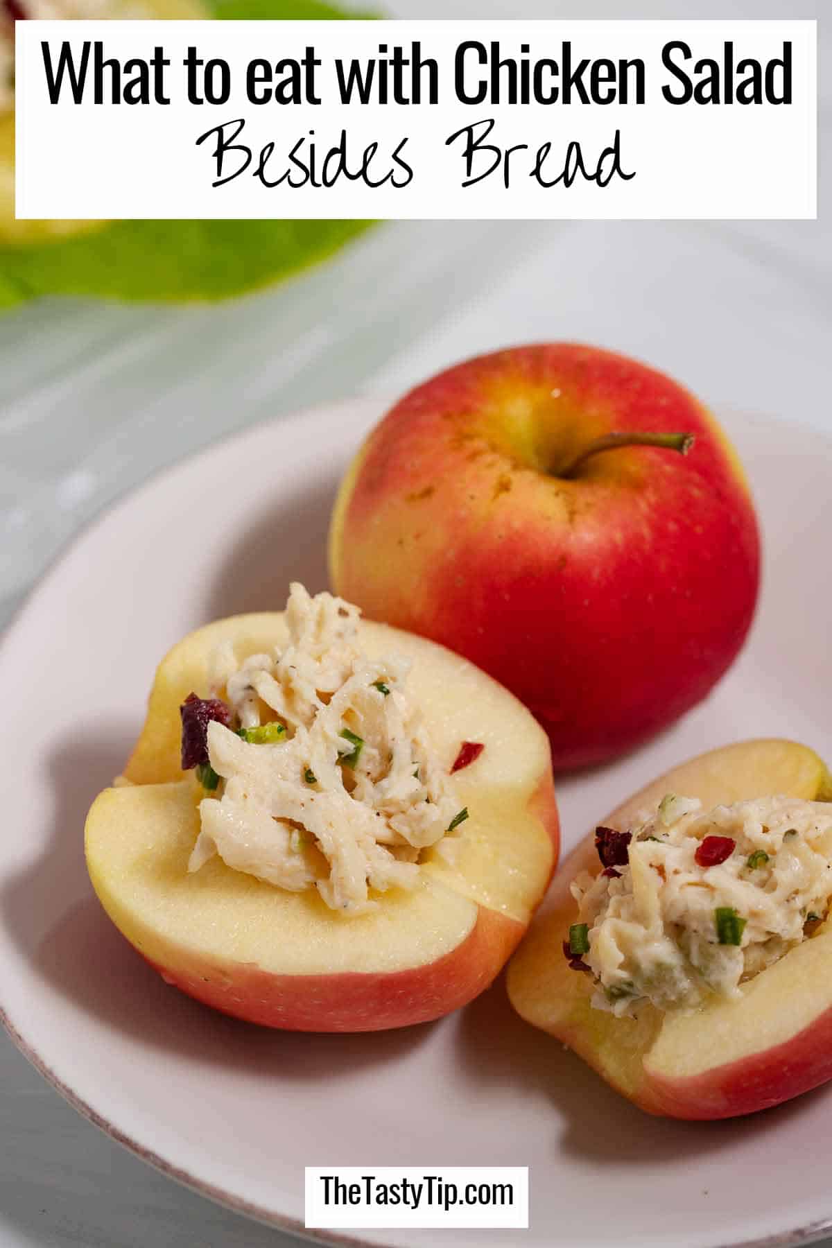 What to eat with chicken salad instead of bread pin with chicken salad stuffed apples on a plate.