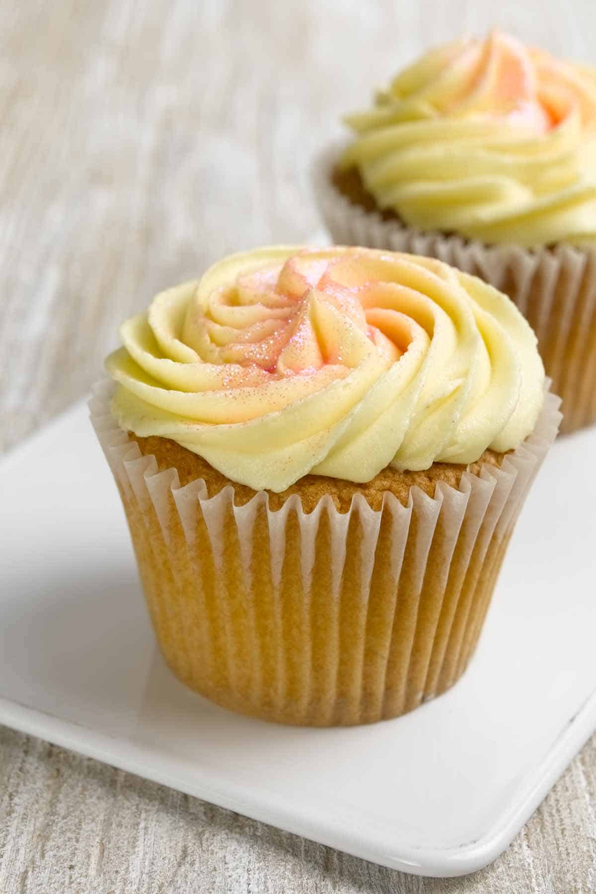 Lemon cupcake with cream cheese filling and frosting.