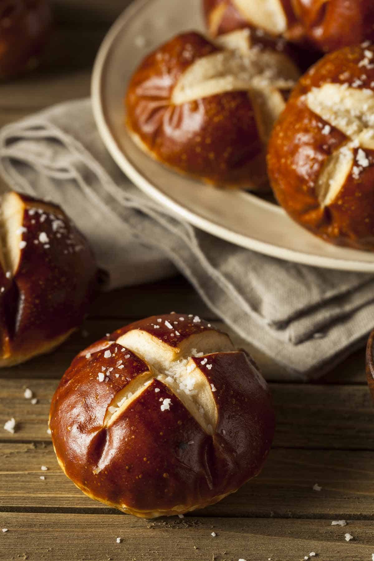 Bowl of pretzel buns. Pretzel buns are on of the best breads for sloppy joes sandwiches.