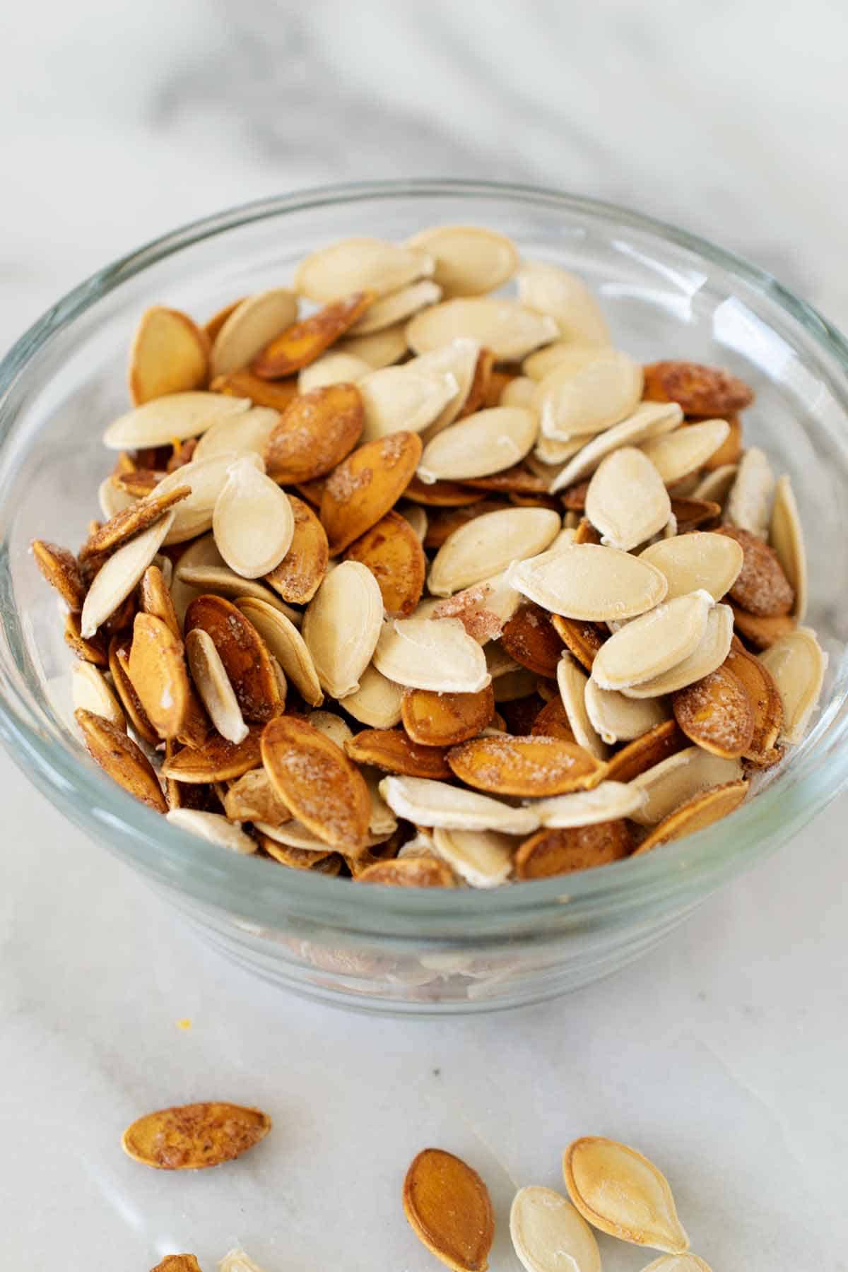 Bowl of roasted pumpkin seeds.