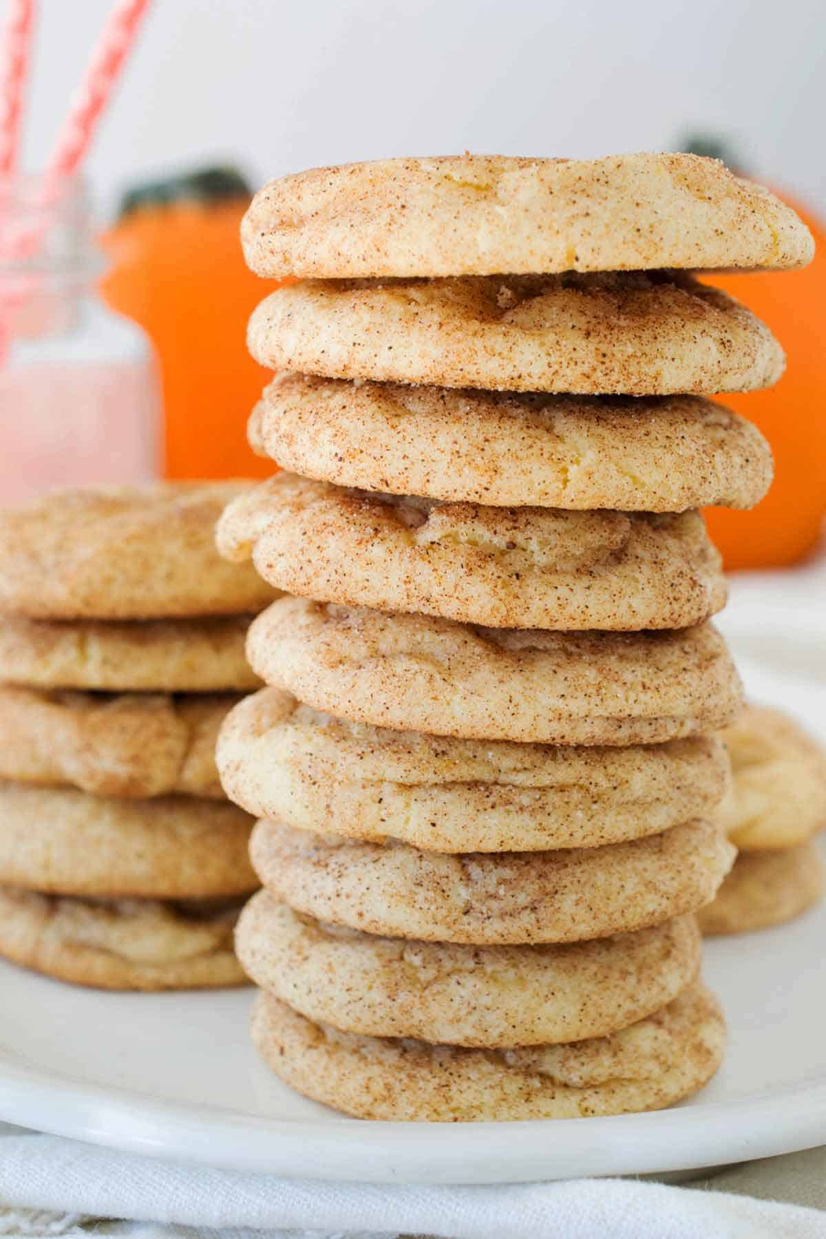 Stack of pumpkin snickerdoodle cookies on a plate.